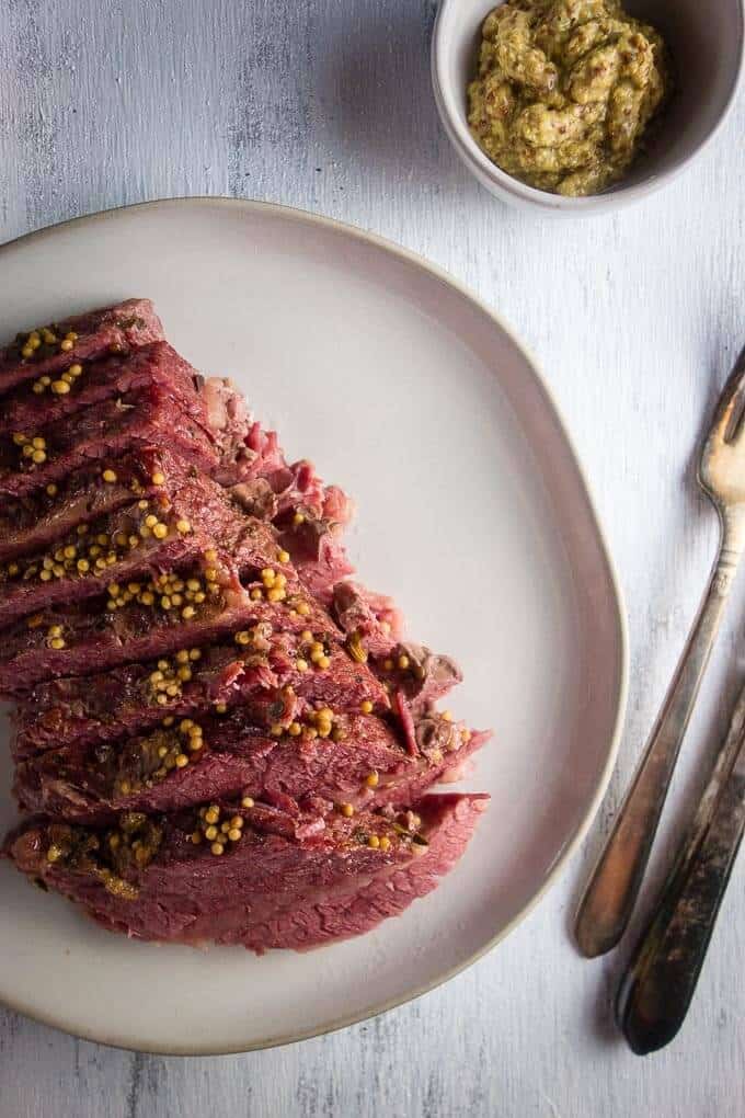 Sliced corned beef on a platter.