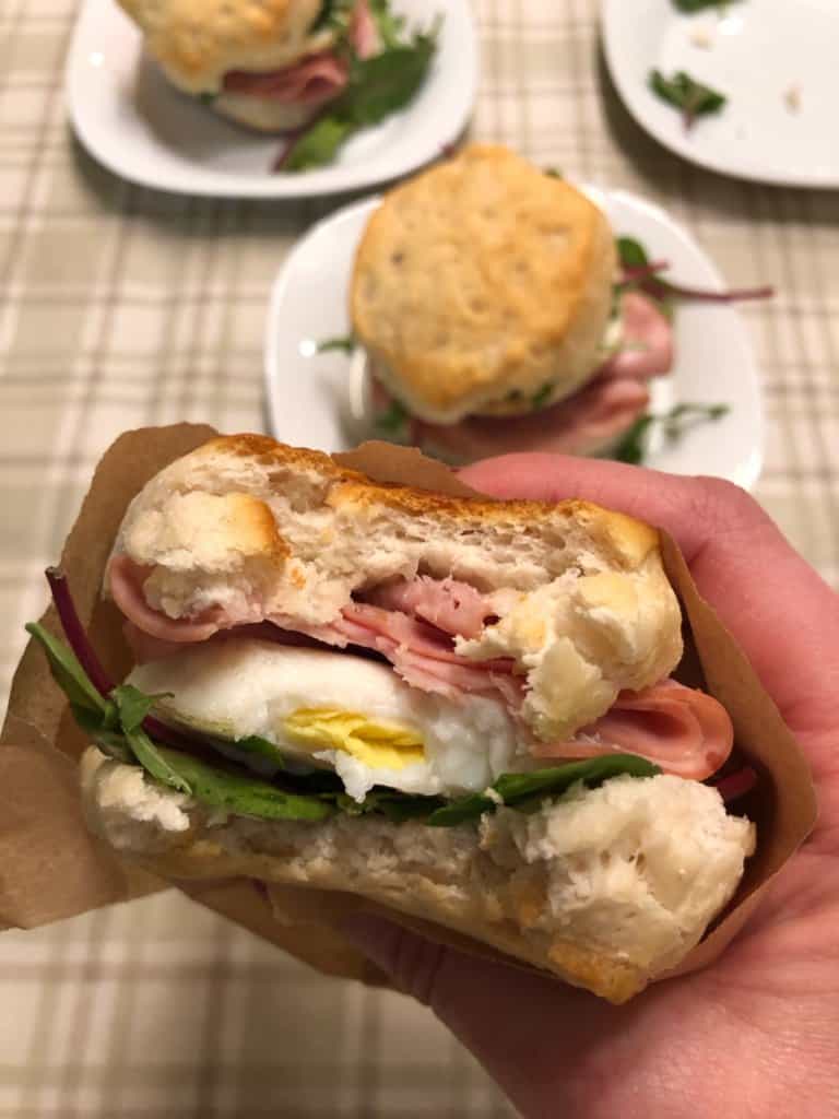 Biscuit with egg, spinach, and ham.