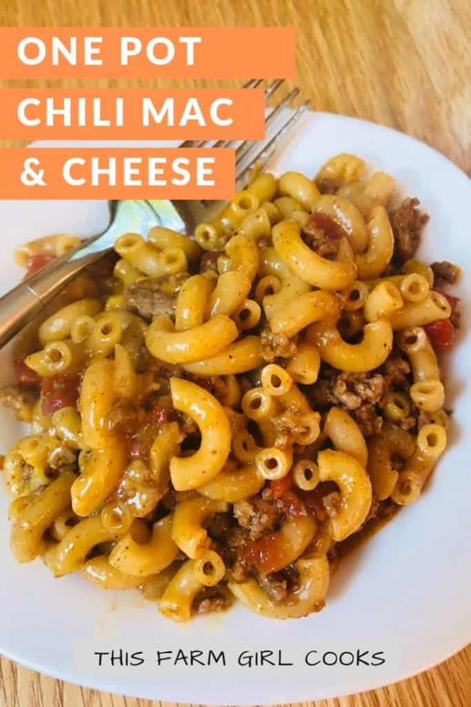 one pot chili mac and cheese on a plate with a fork.
