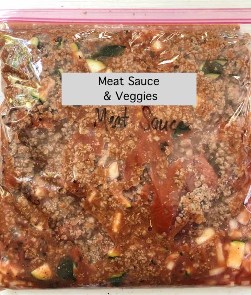 Meat sauce and veggies in a gallon sized ziplock bag.