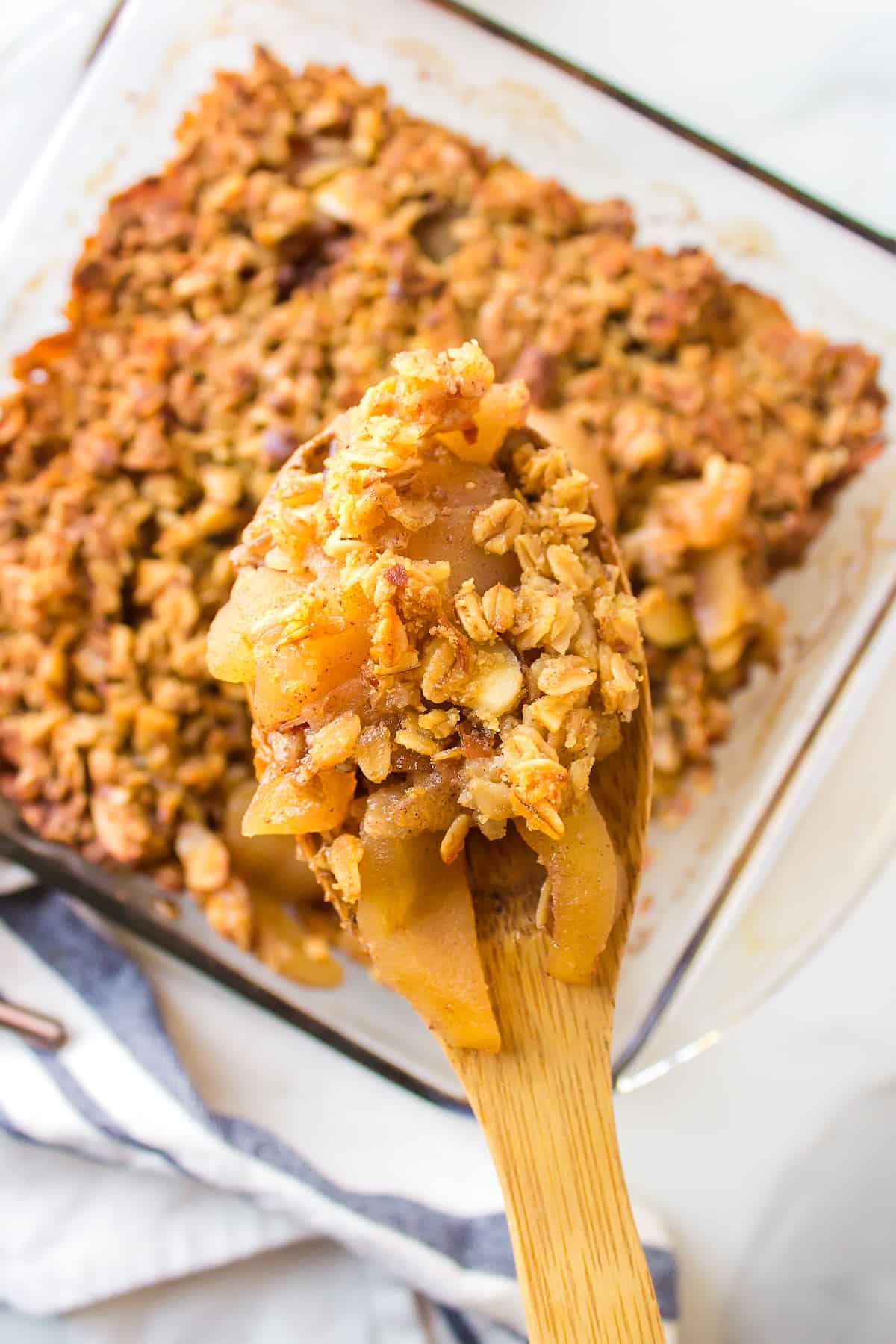 A spoonful of baked apple crisp.