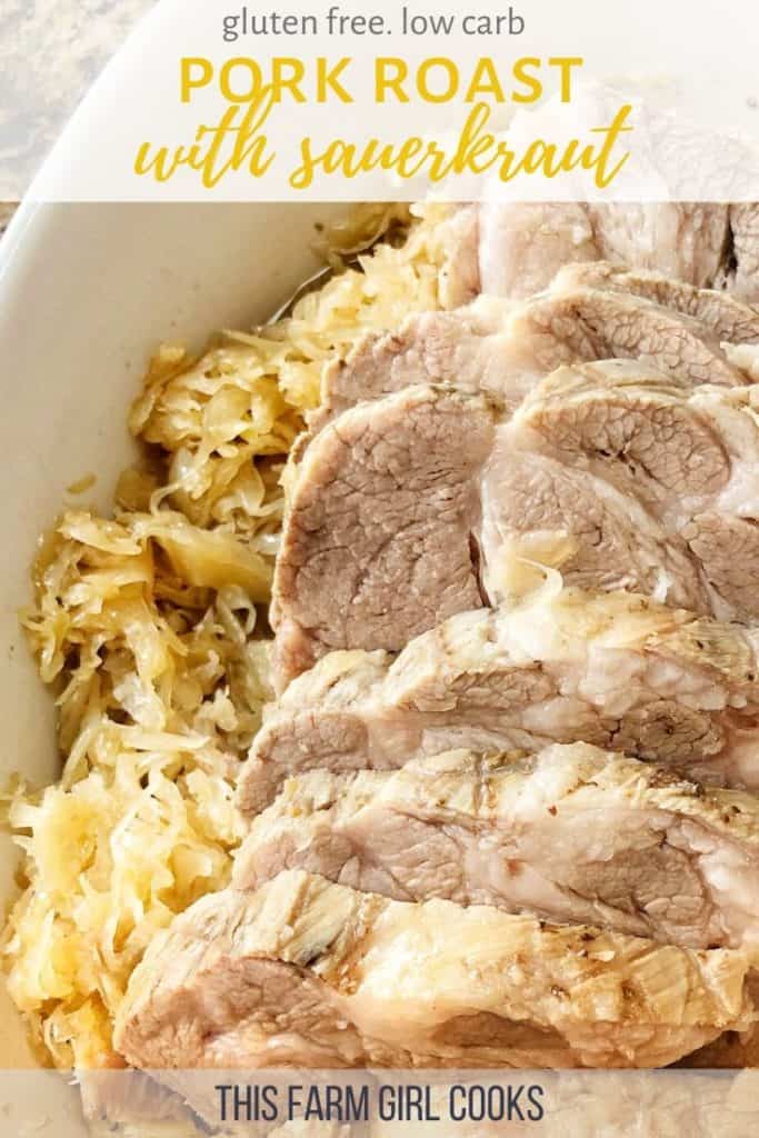 Pork roast with sauerkraut in a baking dish.