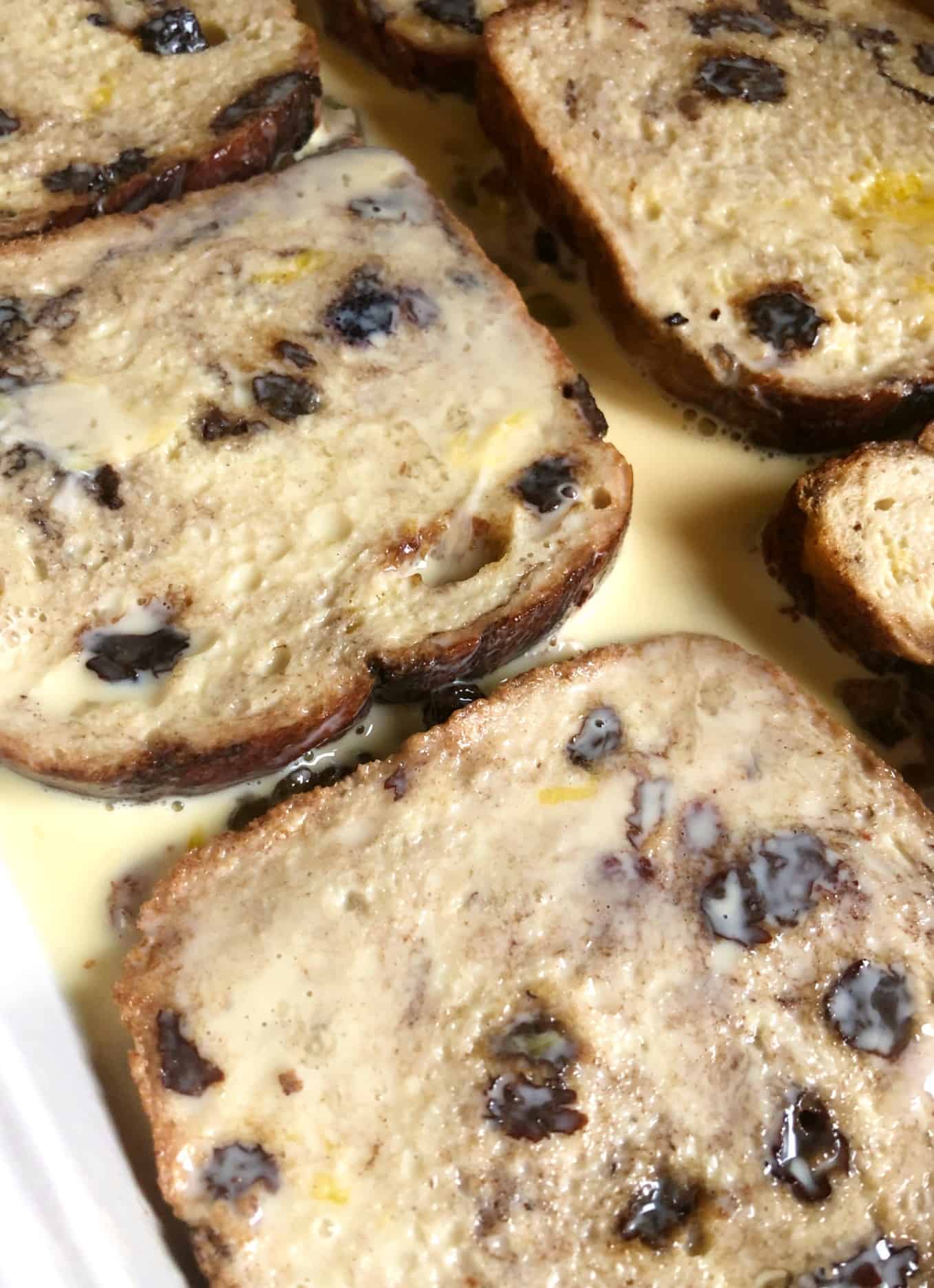 Raisin bread in French toast batter.