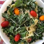 Kale salad with tomatoes and parmesan.