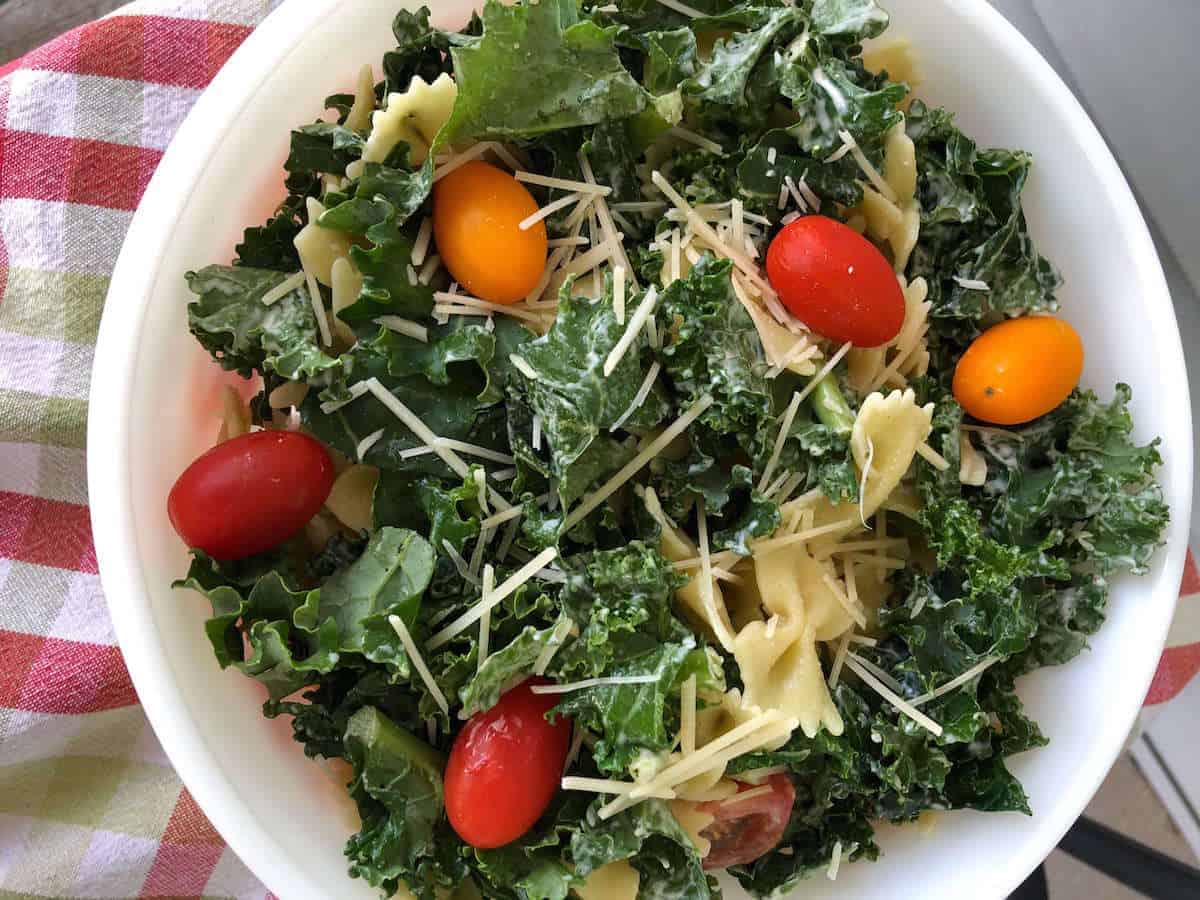 Kale salad with tomatoes and parmesan.