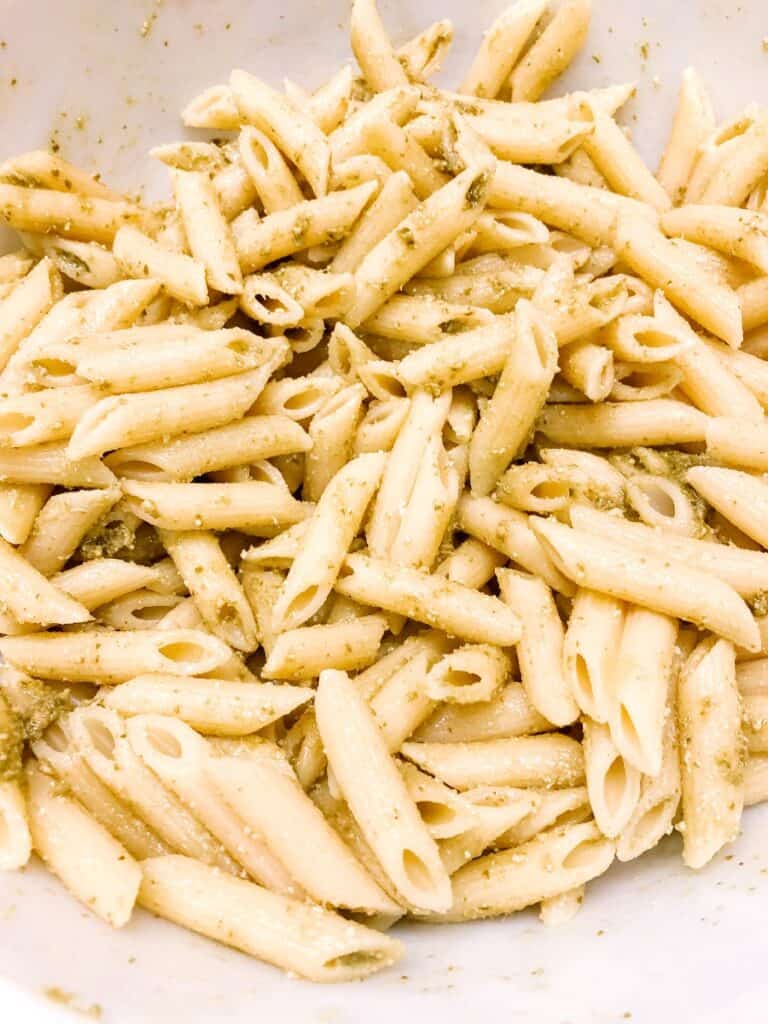 Penne pasta tossed in basil sauce.