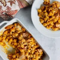 Mac and cheese with pizza sauce and sausage.