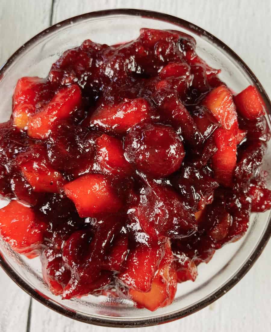 Cranberry apple chutney in a mason jar.