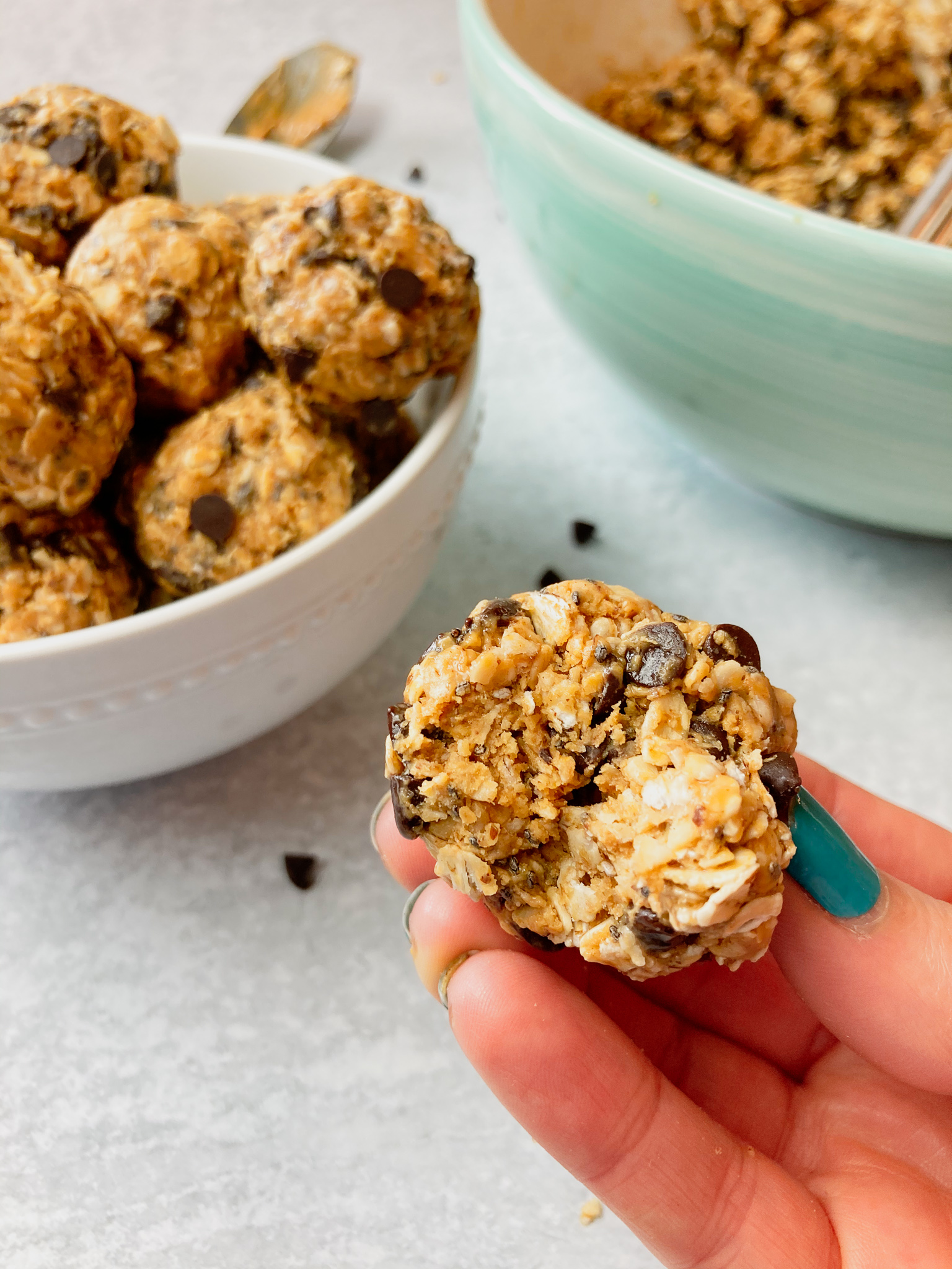 The inside of a protein bite with oatmeal and chocolate chips showing.