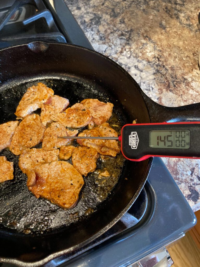 cooked pork with temperature of 145