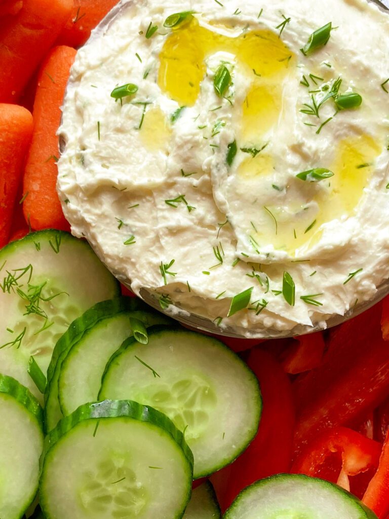 whipped feta dip drizzled with olive oil and dill