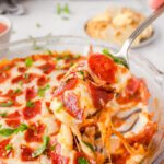pepperoni dip in a glass pie plate.
