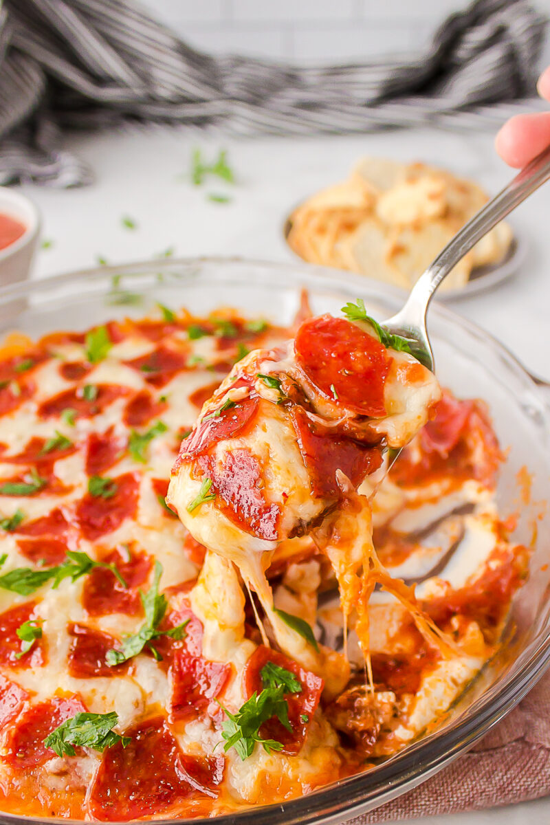 pepperoni dip in a glass pie plate.