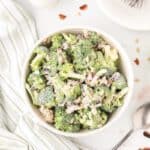 A finished bowl of broccoli crunch salad with bacon.