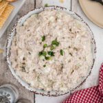 a bowl of tuna salad with egg