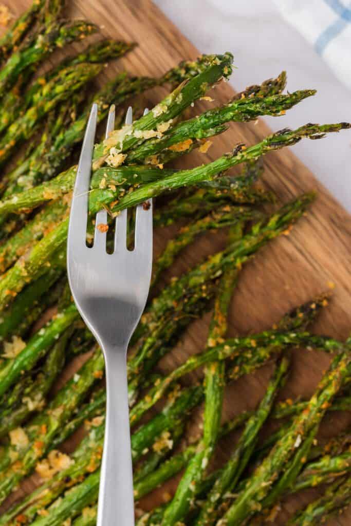 cooked asparagus on a fork