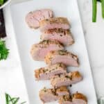 Air fryer pork tenderloin on a platter.