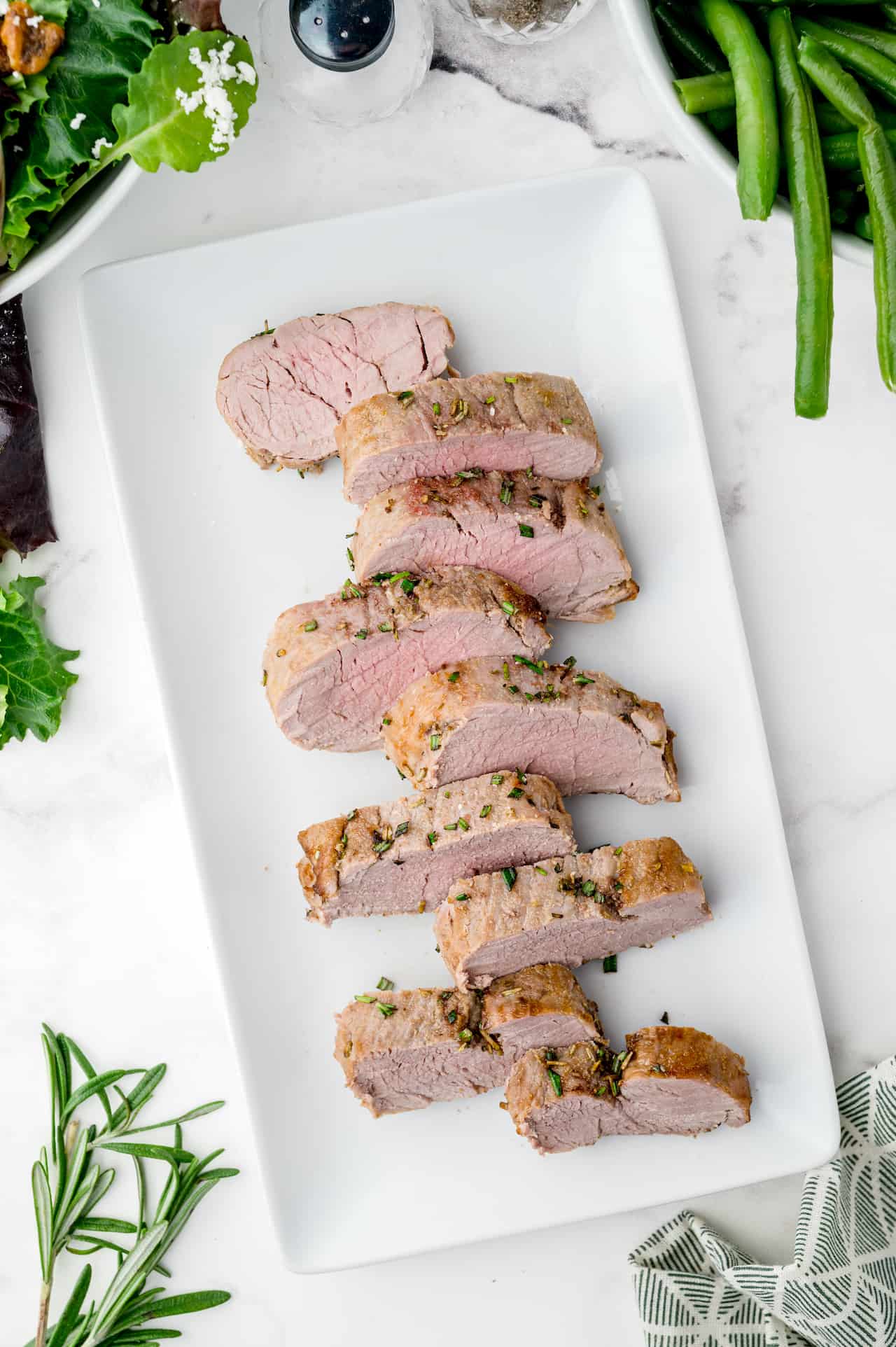 Air fryer pork tenderloin on a platter.