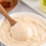 A wooden spoonful of chipotle mayo.