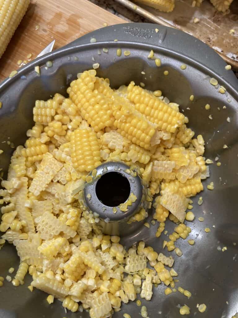 Cut corn in a bundt pan.
