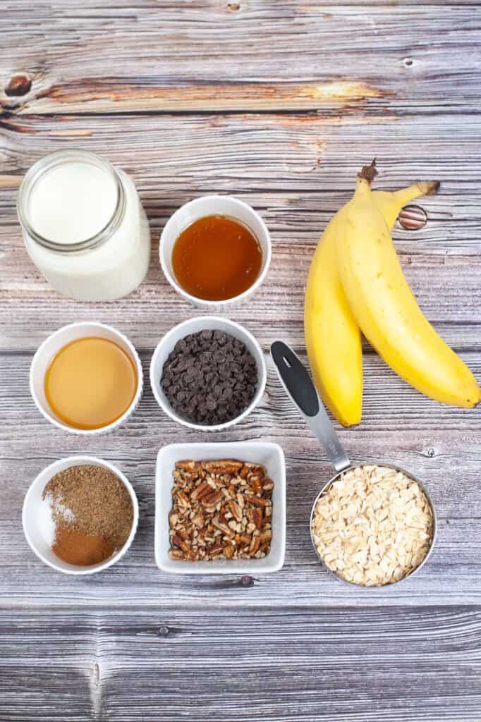 Ingredients for banana bread overnight oats laid on a table.