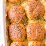 Cheesy Hawaiian Roll Roast Beef Sliders on a baking sheet, perfect for game day and tailgating.
