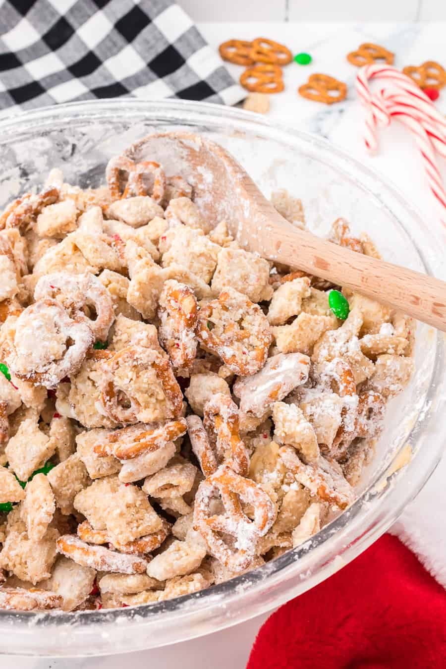 Christmas puppy chow in a glass bowl.
