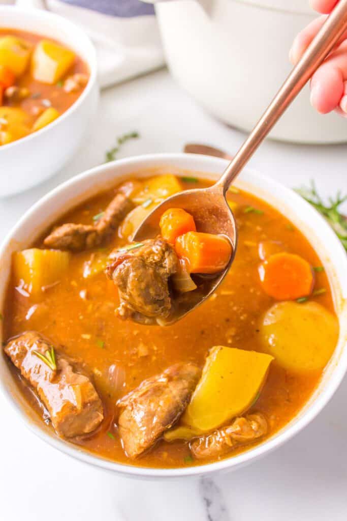 A spoonful of gluten-free beef stew.