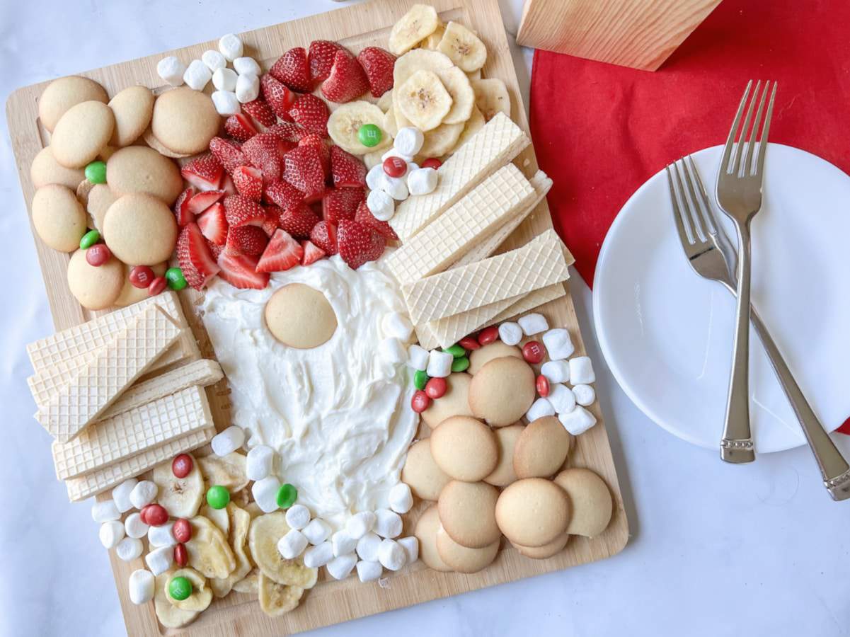 Santa gnome dessert board with fruit dip.