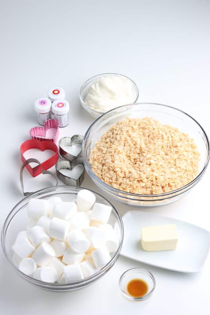 Ingredients in glass bowls to make rice krispie treats