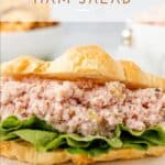 Old fashioned ham salad on a croissant with lettuce.
