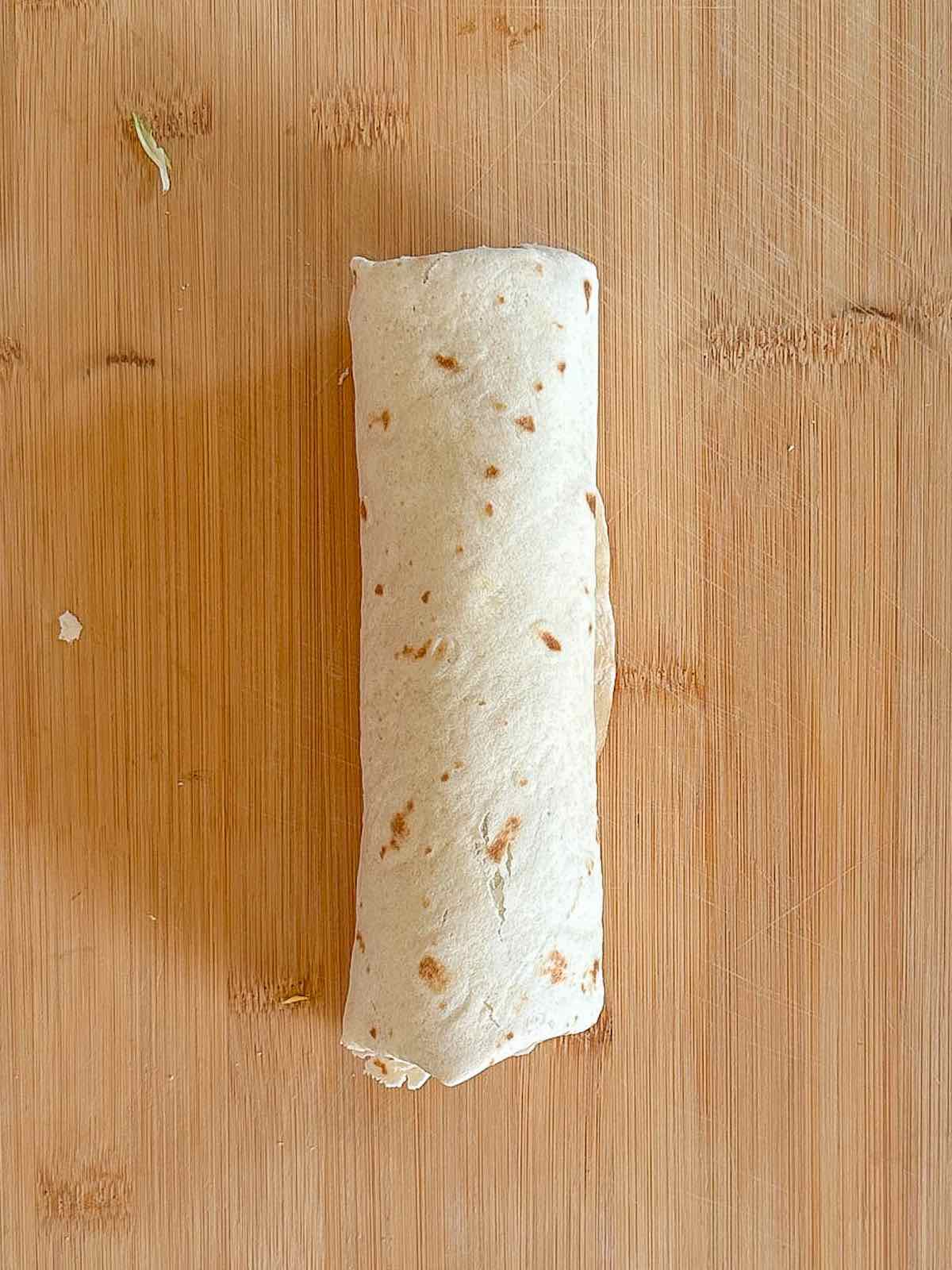 Roast beef wrapped in a flour tortilla.