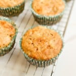 Sourdough banana muffins on a wire cooling rack.