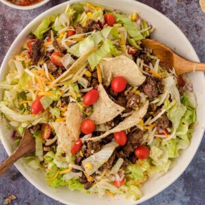 A classic taco salad with ground beef, lettuce, cheese and tortilla chips.