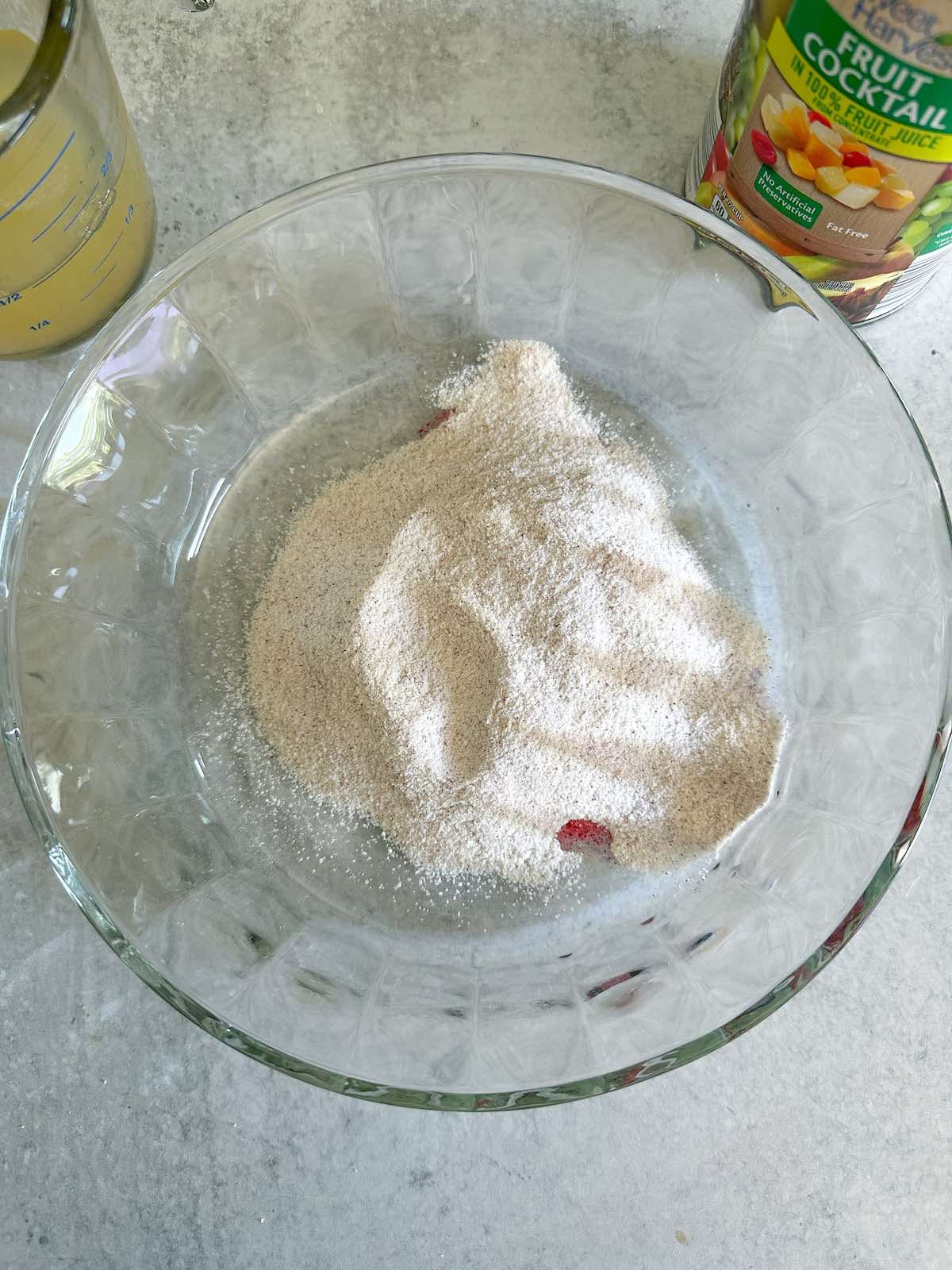 Powdered gelatin in a glass bowl.