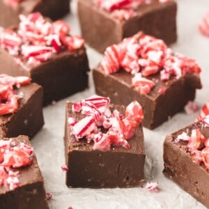 Cubes of chocolate fudge topped with crushed candy canes.