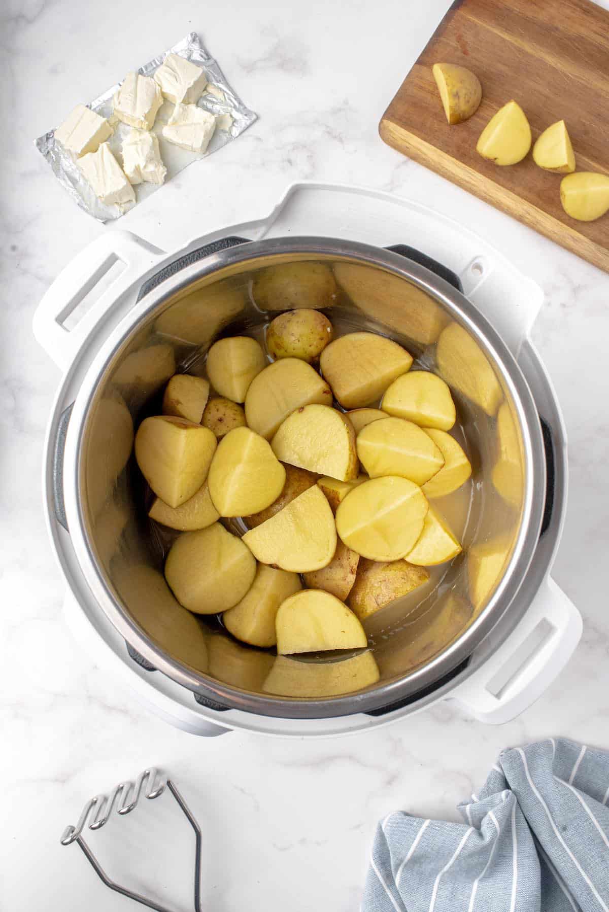 Cut potatoes in an Instant Pot.