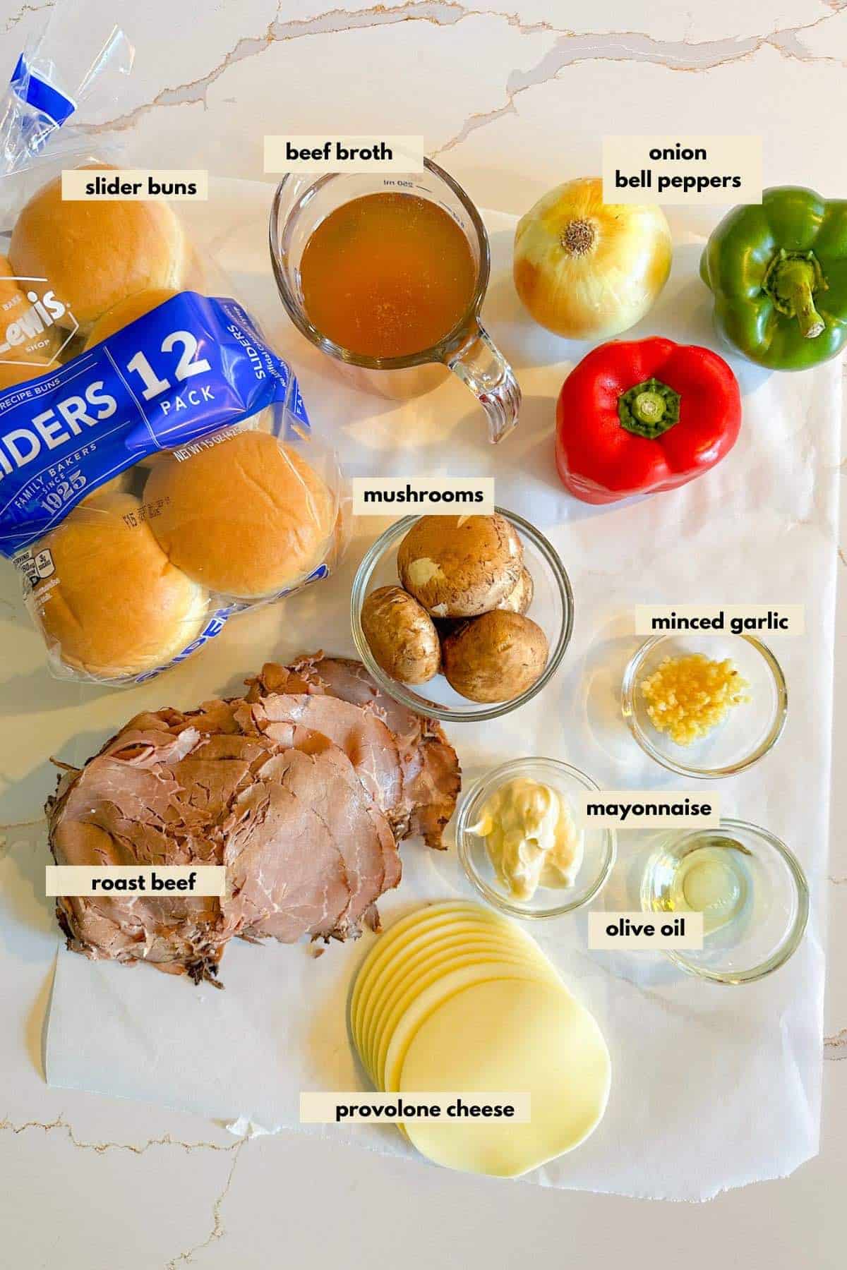 Ingredients to make sliders include buns, roast beef, provolone cheese, onion, bell pepper, garlic, olive oil, beef broth and mushrooms.