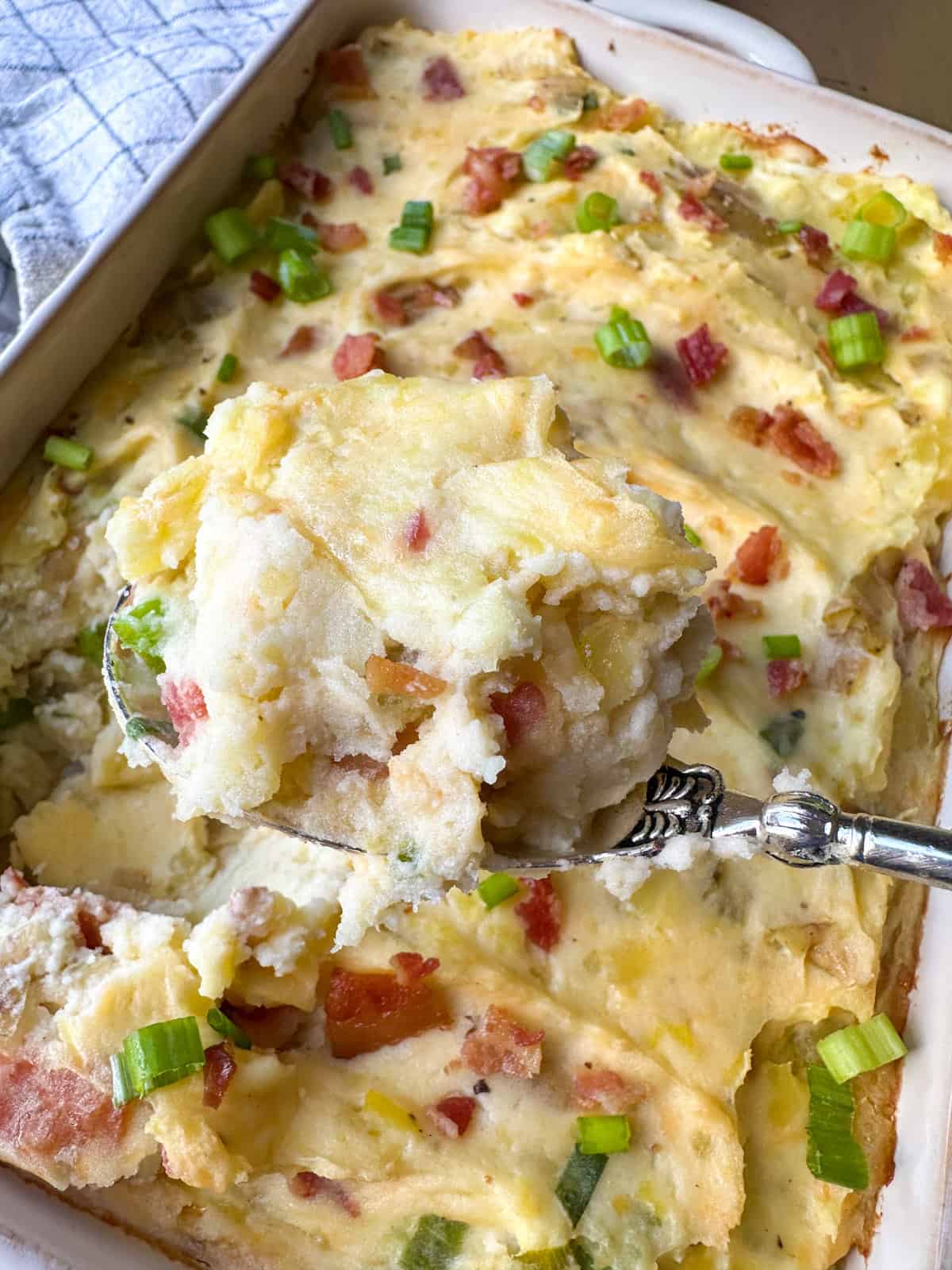 A scoop of mashed potato casserole.