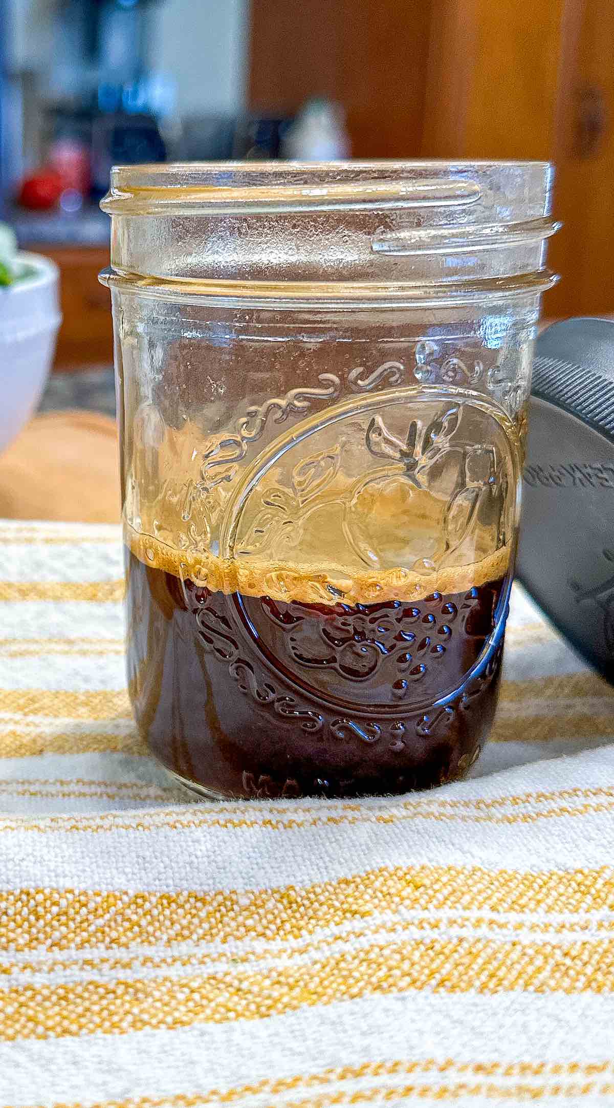 A jar of marinade for stir fry.