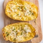 Air fryer spaghetti squash topped with cheese and spices.