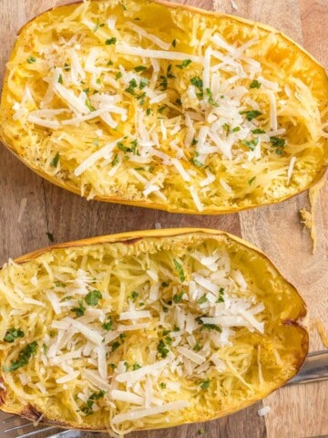 Air fryer spaghetti squash topped with cheese and spices.