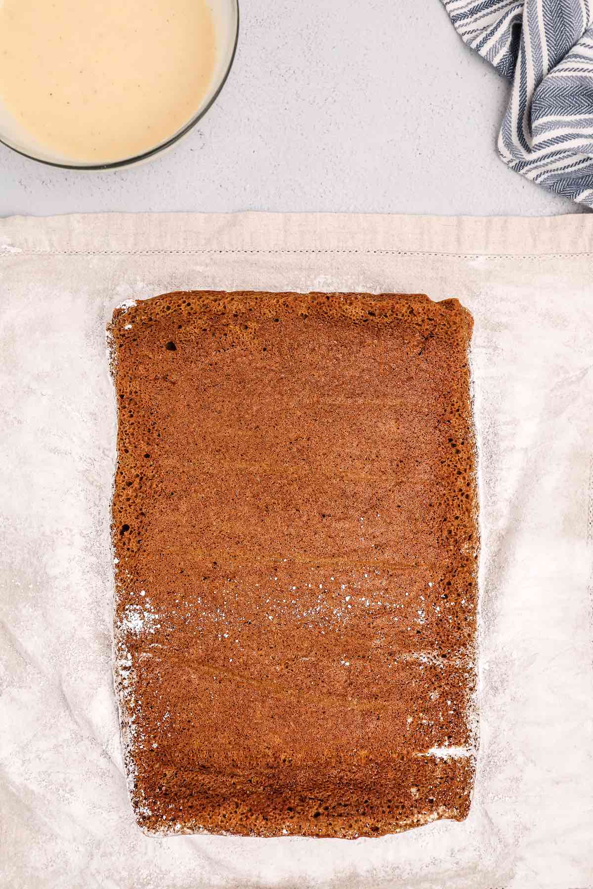 Gingerbread cake on a tea towel.