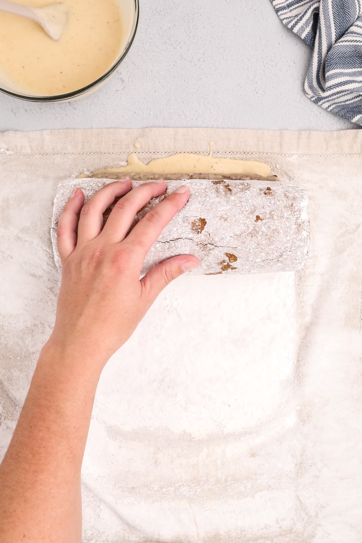 A rolled up gingerbread cake.