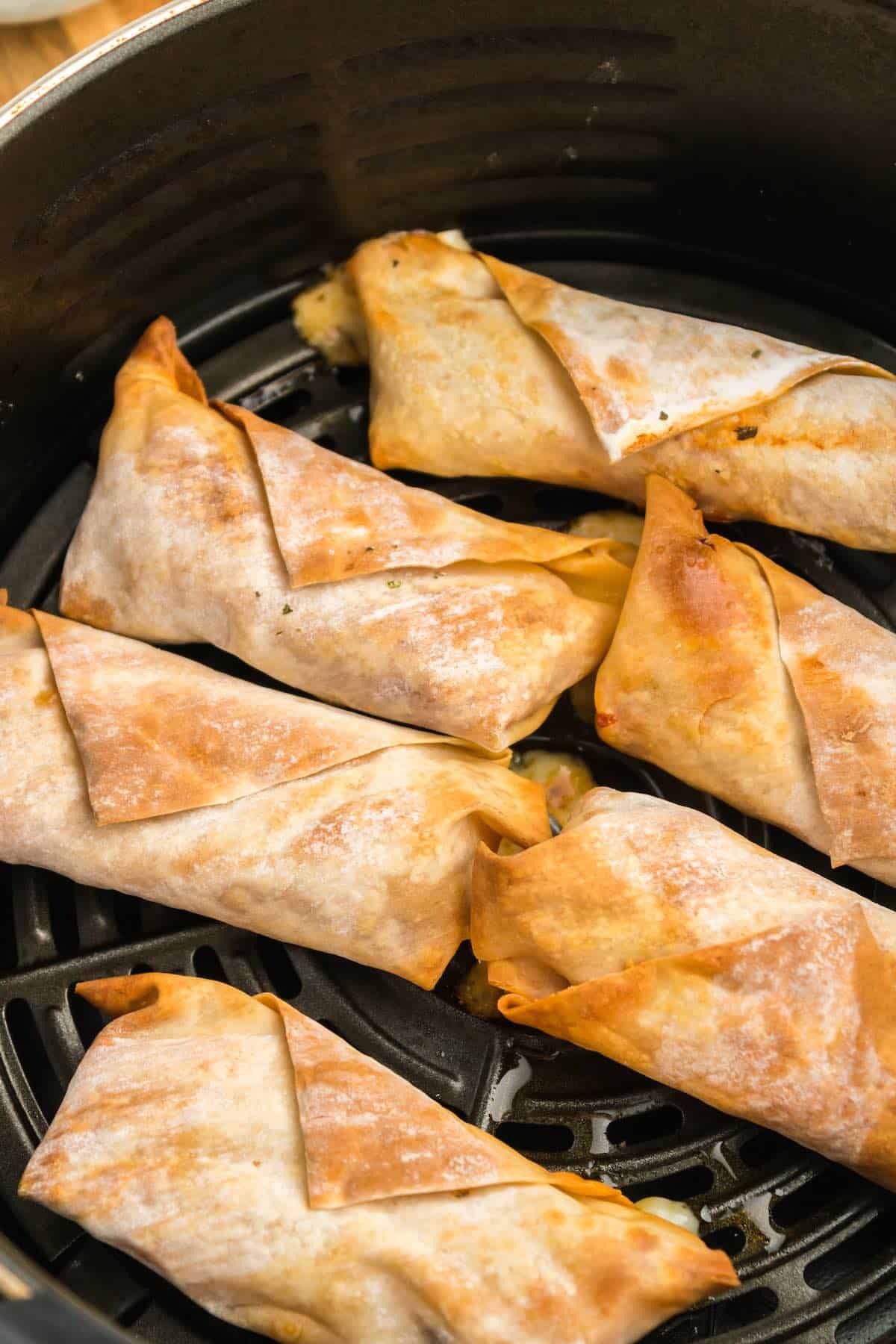 Crispy pizza egg rolls in the air fryer.