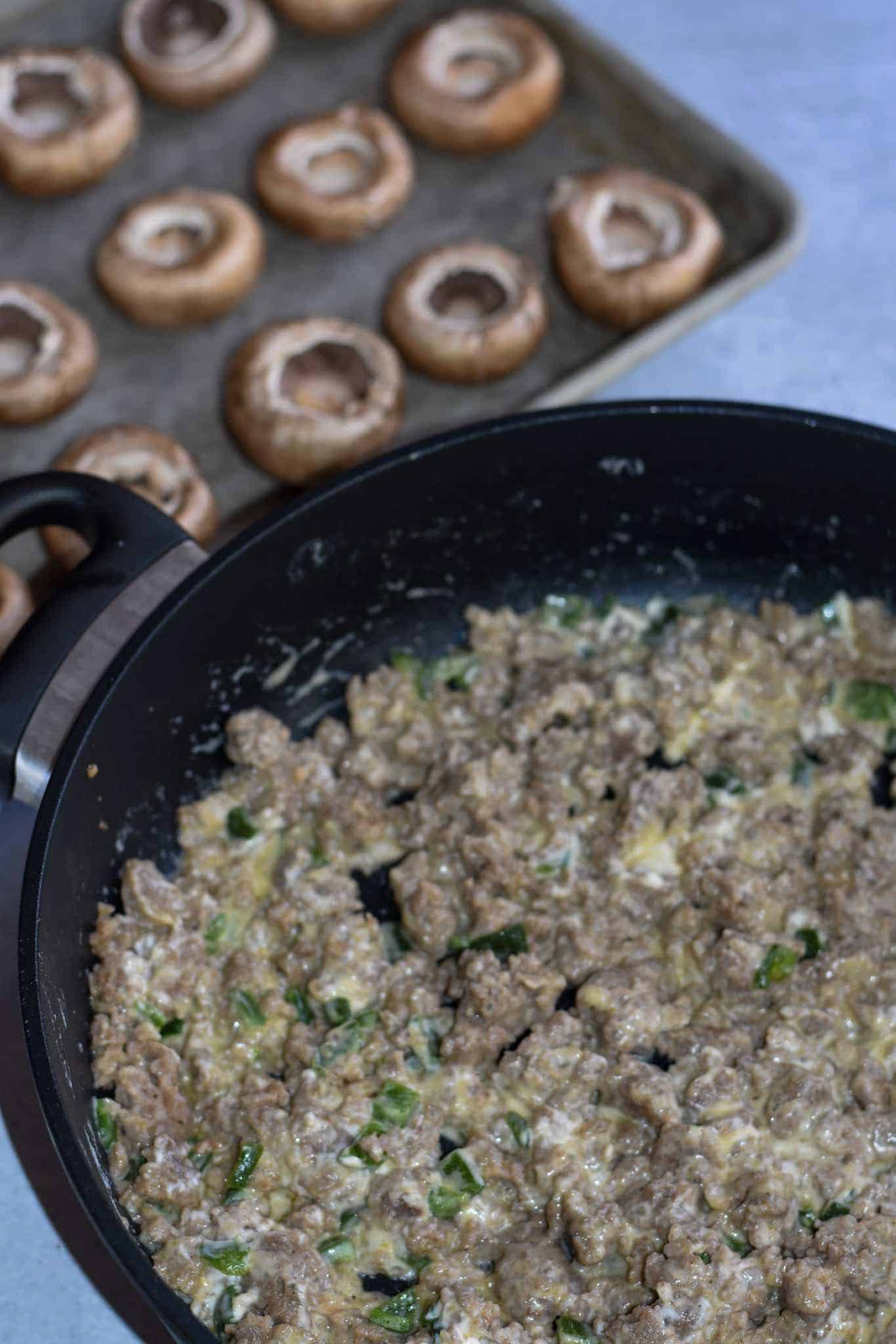 Creamy ground sausage mixture in a skillet.