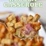 A spoonful of cheesy reuben casserole.