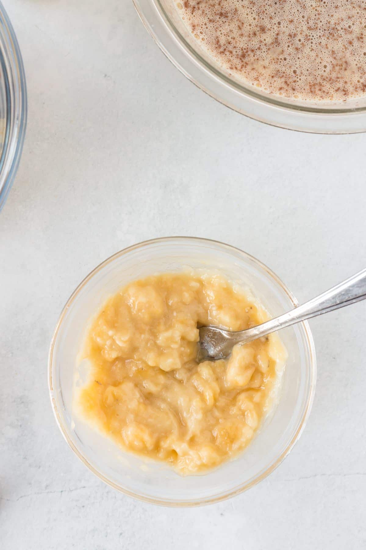 Mashed bananas in a bowl.