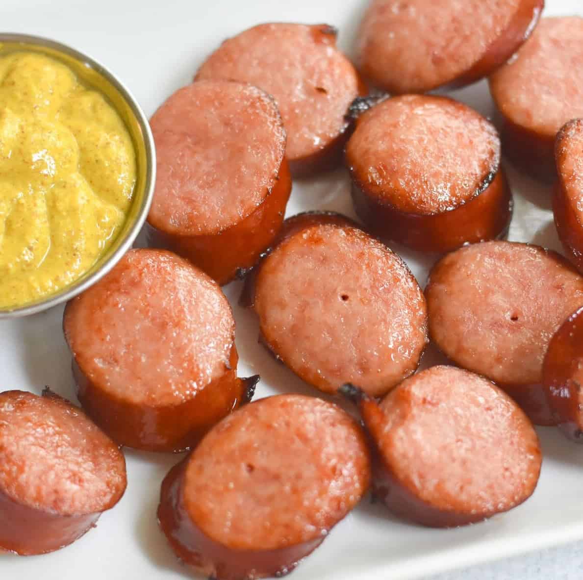 Air fryer kielbasa bites with mustard.