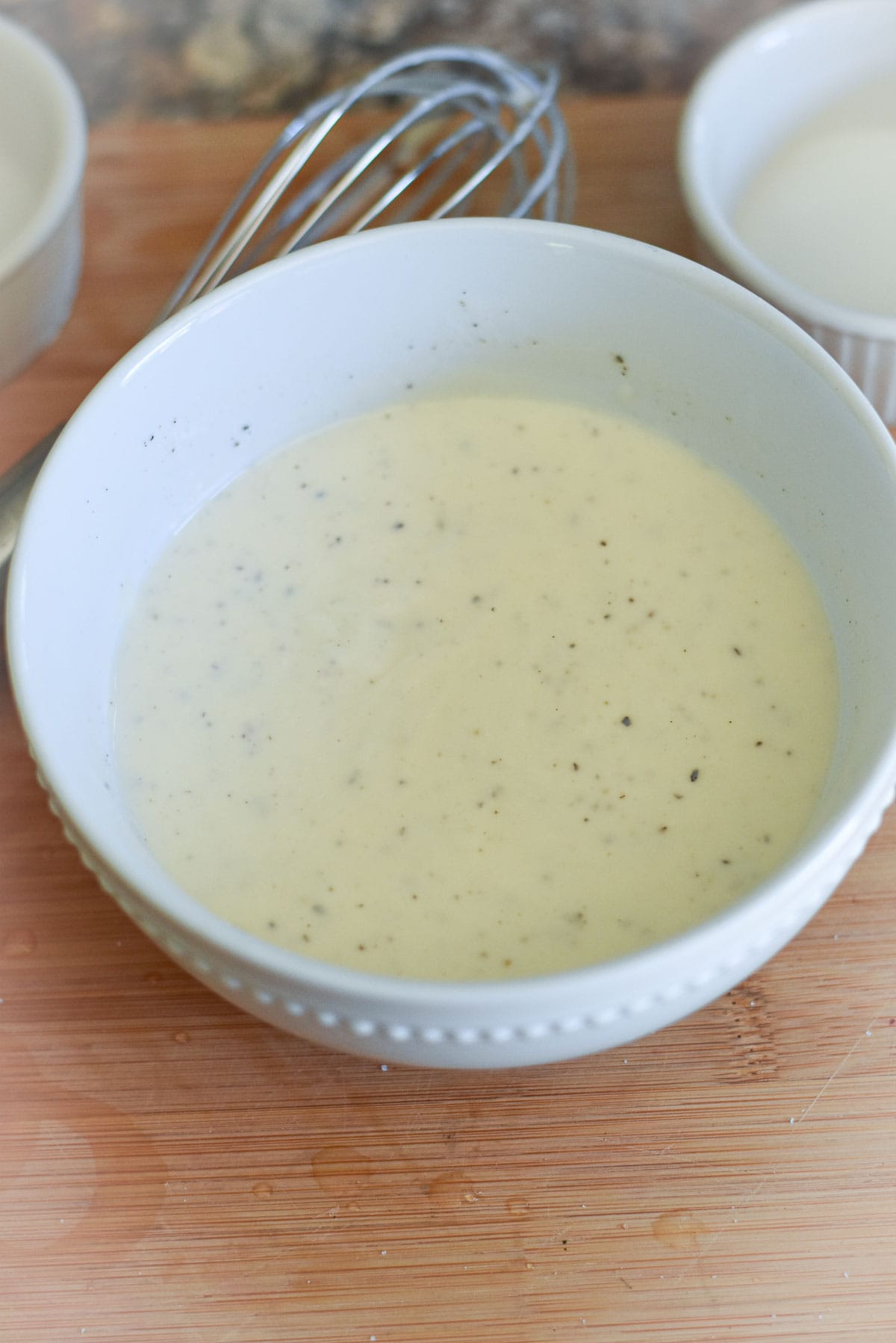 Sweet coleslaw dressing in a bowl.